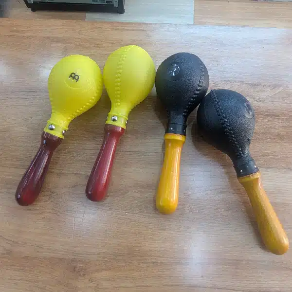 Malaca-7 maracas percussion instrument